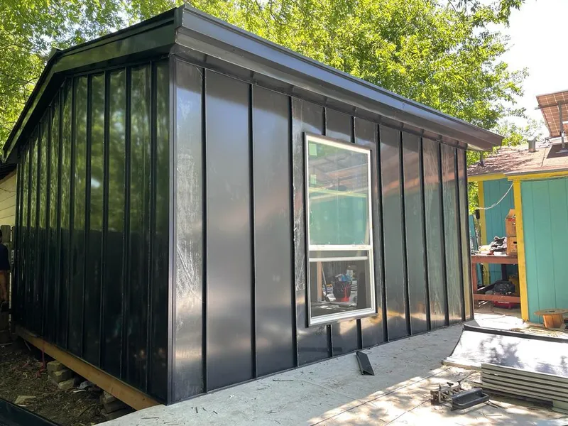 Black standing seam metal wall panels for Roof Inspection in Wilmington Manor